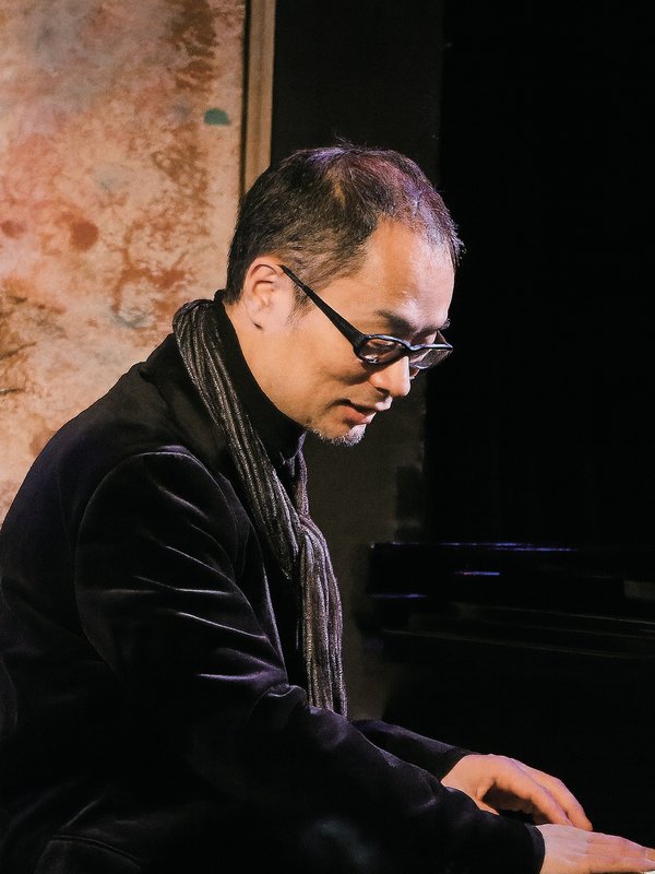 飯田俊明